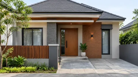 Fasad rumah dengan dinding abu-abu dan aksen kayu cokelat