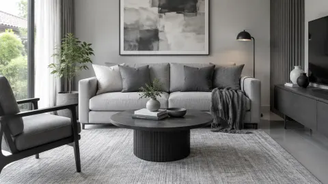 Ruang keluarga dengan sofa dan pilihan warna abu-abu