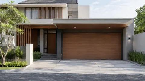 Fasad rumah dengan pintu garasi lebar yang menyatu