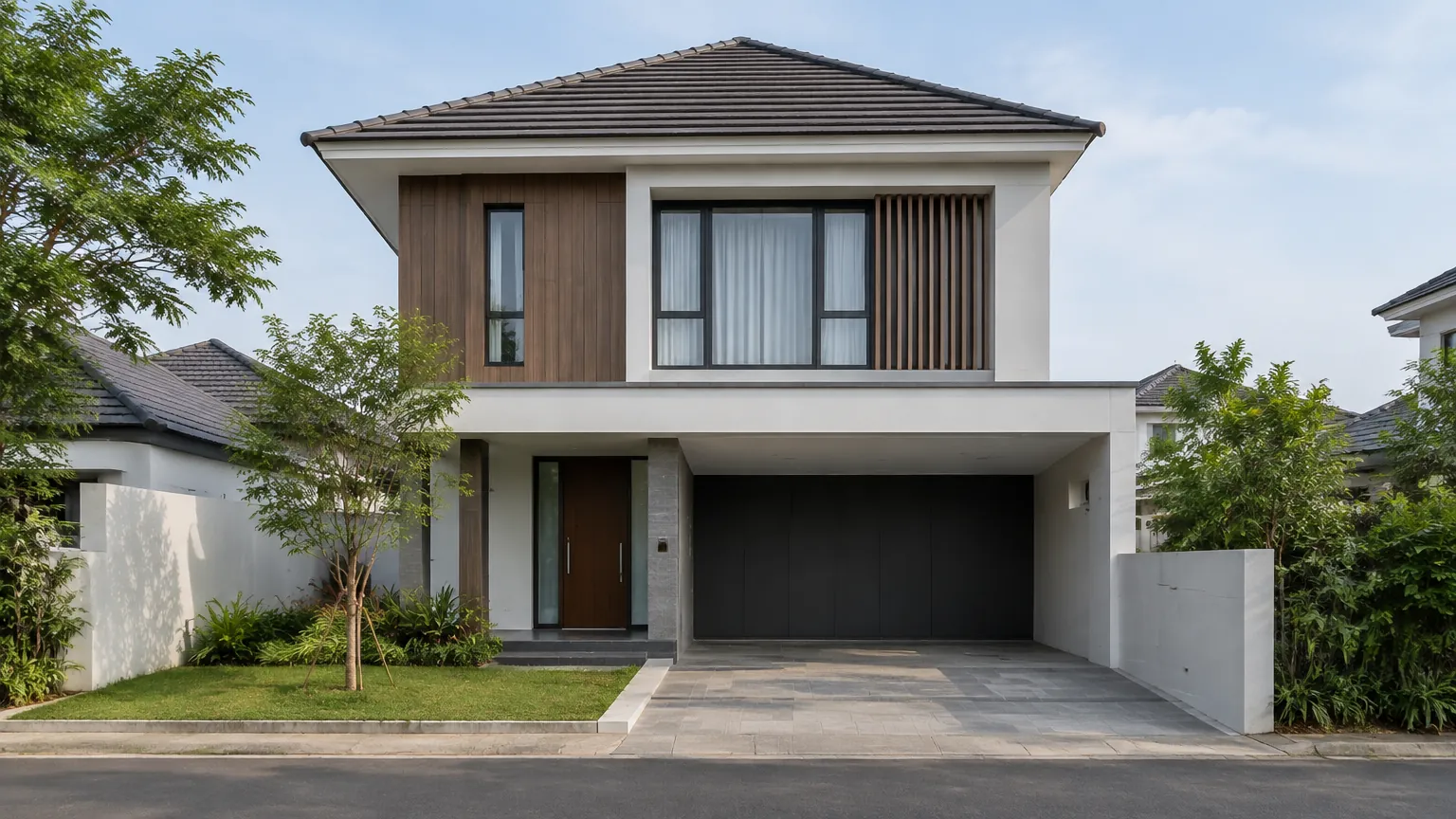 Fasad rumah dua lantai dengan bukaan garasi besar