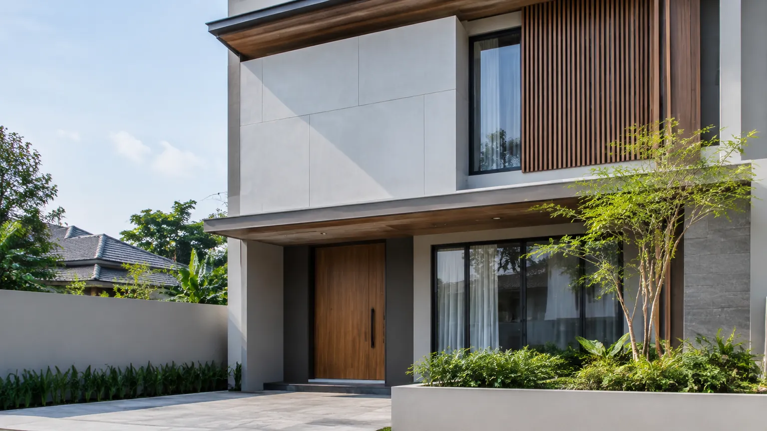 Fasad rumah modern dengan beberapa material dinding