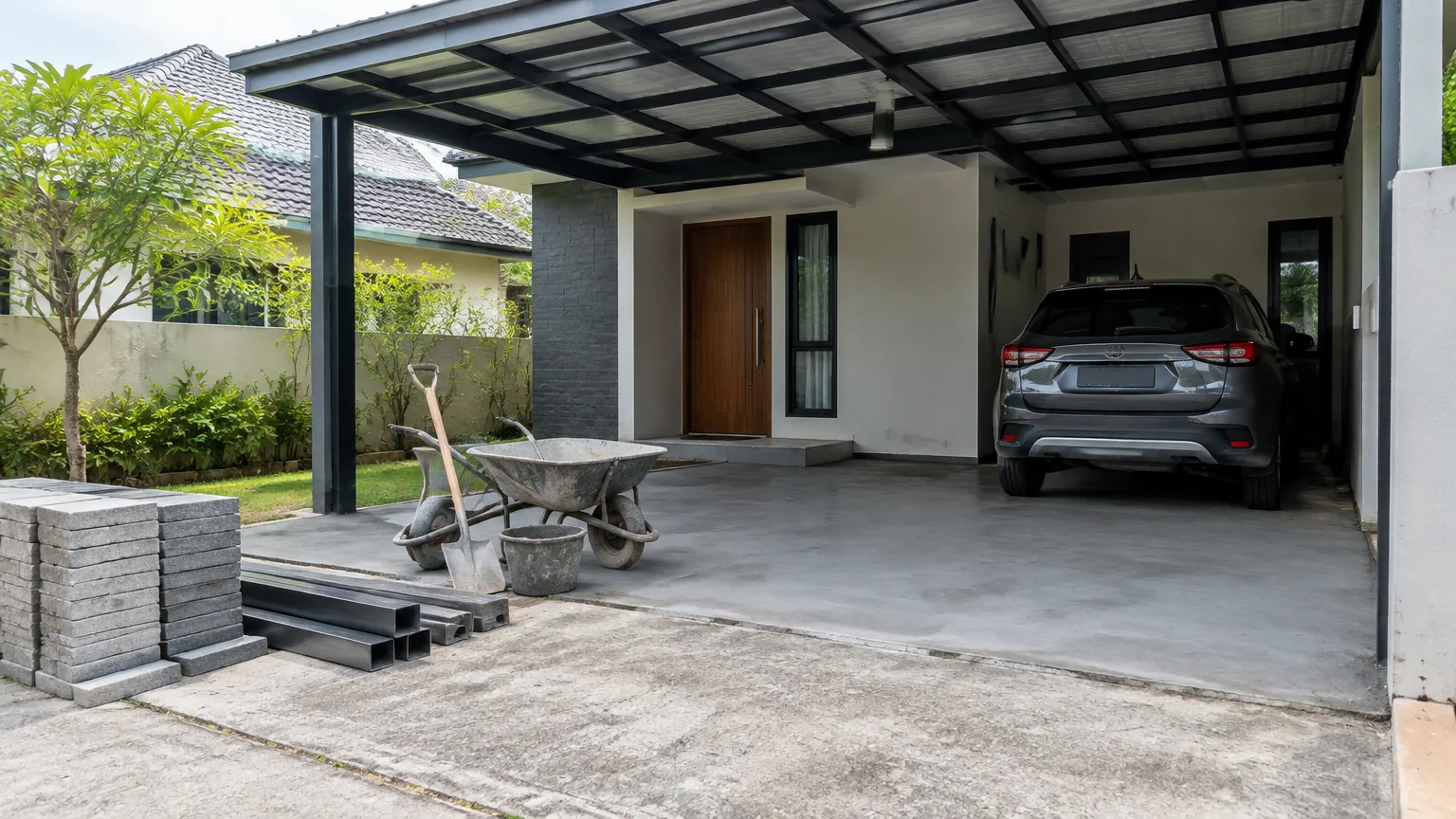 Carport dengan bahan bangunan dan mobil