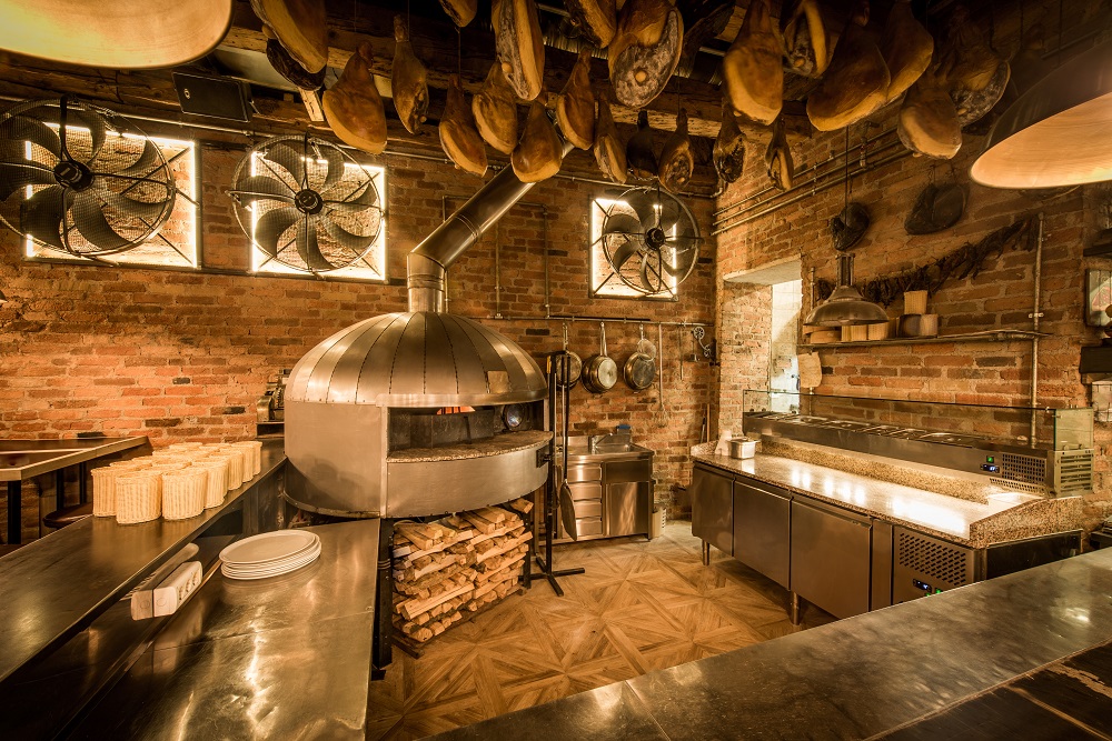 Pizza oven in open kitchen italian restaurant